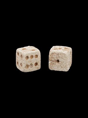 PAIR OF ANCIENT ROMAN STONE DICE 100 TO 300 AD. A pair of ancient Roman hand carved stone dice 
