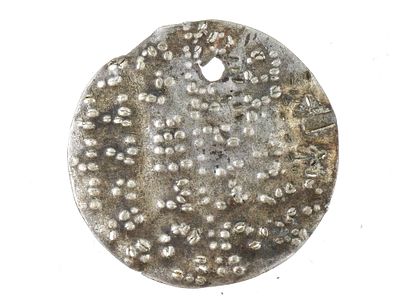 ANCIENT MAGICAL SILVER DISK W DOTTED LETTERS 2000-1000 BC. A rare ancient Western Asiatic silver 
