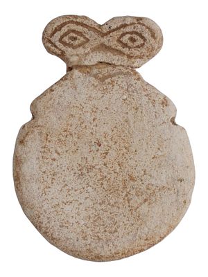 ANCIENT WESTERN ASIAN CARVED STONE EYE IDOL. An ancient Western Asian carved stone eye idol 