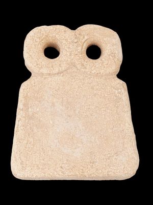 ANCIENT MESOPOTAMIAN RELIGIOUS CARVED STONE EYE IDOL. An ancient Mesopotamian idol from the 3rd 