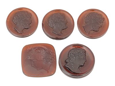 COLLECTION OF FIVE HAND CARVED CARNELIAN CAMEOS. A collection of hand carved carnelian cameos. A 