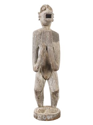 WEST AFRICAN BAULE MONKEY FIGURE FROM IVORY COAST. A West African hand carved figure of a monkey 