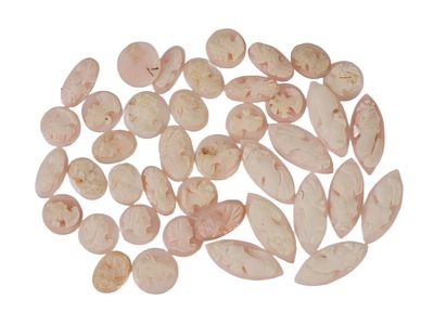 VINTAGE CARVED CORAL CAMEOS WITH FEMALE RELIEF PROFILES. A collection of 40 antique or vintage 