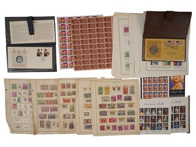 COLLECTION OF VINTAGE AMERICAN POSTAGE STAMPS. A collection of vintage American philatelic items 