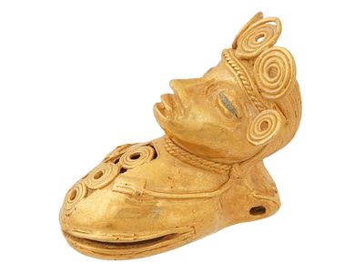 PRE COLUMBIAN TAIRONA TUMBAGA BABY RATTLE FIGURE. An ancient Pre Columbian Tairona tumbaga gilt 