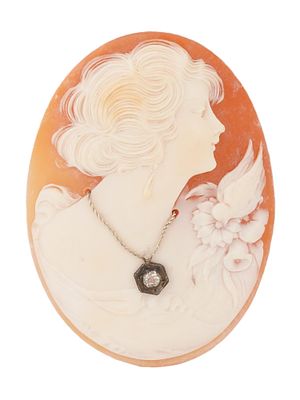 ANTIQUE CARNELIAN SHELL CAMEO WITH DIAMOND. An antique carnelian shell cameo of oval shape 