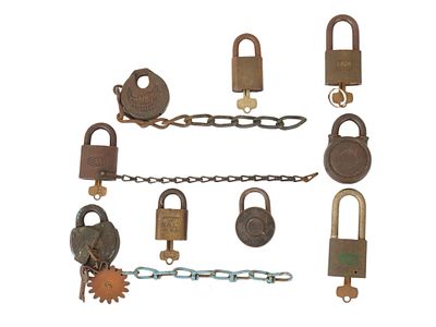 LOT OF ANTIQUE BRASS RAIL ROAD LOCKS WITH KEYS. A collection of nine antique brass railroad 