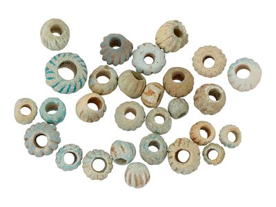 GROUP OF ANCIENT EGYPTIAN LATE PERIOD FAIENCE BEADS. A collection of ancient Egyptian faience 
