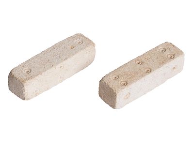 ANCIENT ROMAN CARVED STONE ELONGATED DICE 100 TO 300 AD. A pair of ancient Roman carved stone 