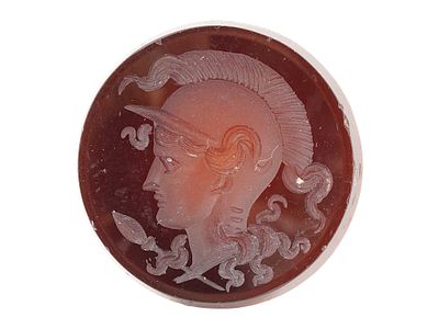 ROMAN MANNER CARVED STONE PORTRAIT INTAGLIO SEAL. A circular shaped hand carved stone probably 
