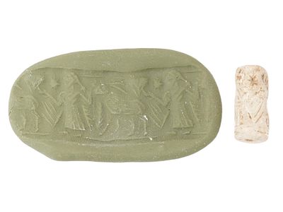 ANCIENT MESOPOTAMIAN FAIENCE CYLINDER SEAL BEAD. An ancient Mesopotamian hand carved faience 