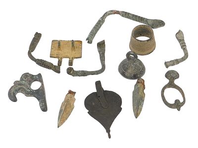 ANCIENT EGYPTIAN BRONZE ARTIFACTS SPEAR POINTS FIBULAS. A group of ancient Egyptian bronze 