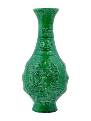 CHINESE CARVED SCENE GREEN GLAZED PORCELAIN VASE. A Chinese green glazed porcelain vase. The 