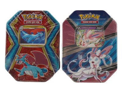 LOT OF 2 SEALED POKEMON TINS. A pair of factory-sealed Pokemon Trading Card Game tins. These 