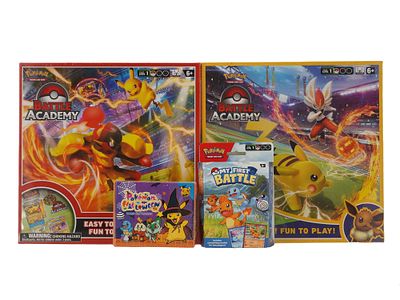 LOT OF 4 MIXED SEALED POKEMON BOXES. An assortment of four sealed Pokemon card game boxes. This 