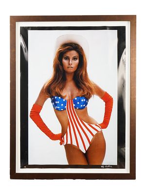 OVERSIZE RAQUEL WELCH PHOTO AUTOGRAPHED BY TERRY ONEILL. An oversize iconic color photo features 