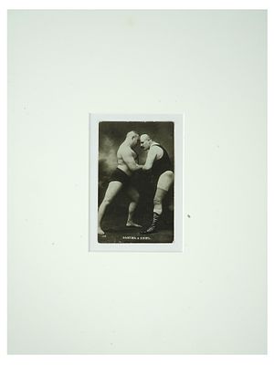 ANTIQUE RUSSIAN PHOTOGRAPH TWO MEN WRESTLING BYSTROV. An antique Russian black-and-white group 