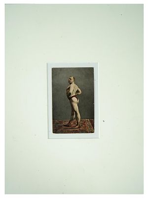 ANTIQUE RUSSIAN PORTRAIT PHOTO OF FAMOUS WRESTLER. An antique Russian post card with a colored 