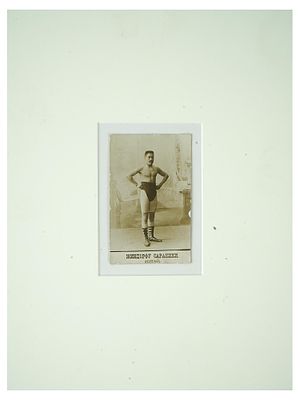ANTIQUE RUSSIAN PORTRAIT PHOTO OF JAPANESE WRESTLER. An antique Russian post card with a black 