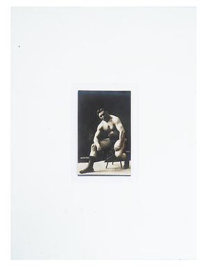 ANTIQUE RUSSIAN PORTRAIT PHOTO OF FRENCH WRESTLER. An antique Russian post card with a black and 