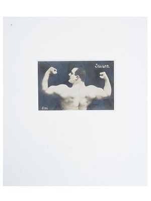ANTIQUE RUSSIAN PORTRAIT PHOTO OF CHAMPION WRESTLER. An antique Russian post card with a black 