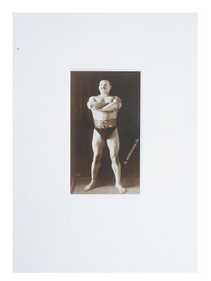 ANTIQUE RUSSIAN PORTRAIT PHOTO OF WRESTLER KORNATSKY. An antique Russian post card with a black 