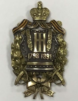 A GOLD RUSSIAN BADGE 114TH INFANTRY REGIMENT. A badge of the Novy Torzhok 114th Infantry 