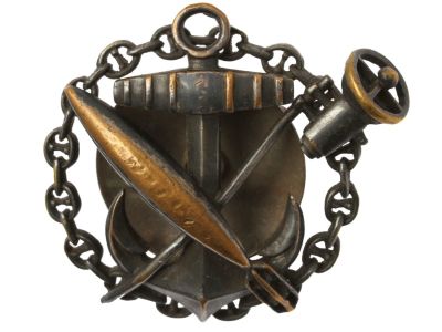 A RUSSIAN BADGE OF THE MINE OFFICER CLASS. A Russian empire badge for graduates of the Mine 