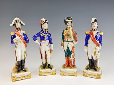 VINTAGE GERMAN SCHEIBE ALSBACH PORCELAIN FIGURINES. A vintage German group of four porcelain 