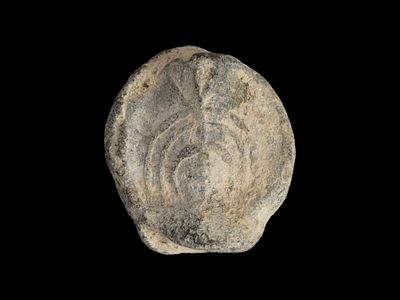 ANCIENT HOLY LAND JUDAICA MENORAH LEAD STAMP SEAL. An Ancient Holy Land lead seal stamp. Dating 