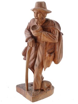 FOLK ART HAND CARVED WOODEN FIGURINE OF TRAVEL MAN. A vintage Folk Art hand carved wooden 