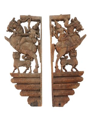 PAIR OF INDIAN CARVED RELIEF WOODEN WALL BRACKETS. A pair of vintage Indian carved relief wooden 