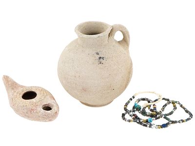 ANCIENT ROMAN TERRACOTTA PITCHER AND LAMP AND NECKLACE. A group of three ancient Roman 