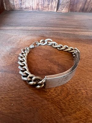 An HM silver gentleman's identification bracelet - 51g.