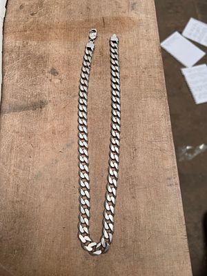 A silver chain link necklace stamped 925. 50cm long, 99g.