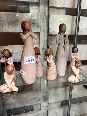 A selection of Willow Tree figures by Susan Lodi.