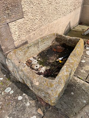 A large hand carved sand stone trough. 75cm x 105cm. Sold off site collection just 5 minutes 