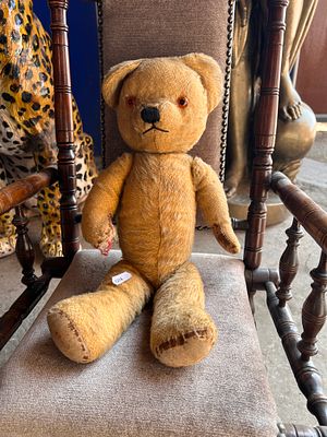 An early 20th century Chad Valley teddy bear.