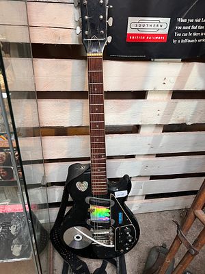 A vintage modified electric guitar.
