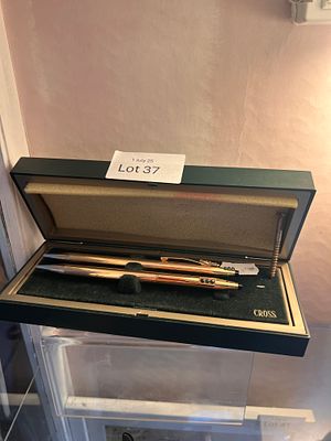 A Cross ballpoint pen and propelling pencil set, 14kt gold filled, pencil having three sapphire 