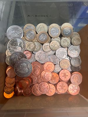A large selection of current collectable UK coins and currency, including 50 pence. Aprox £200 