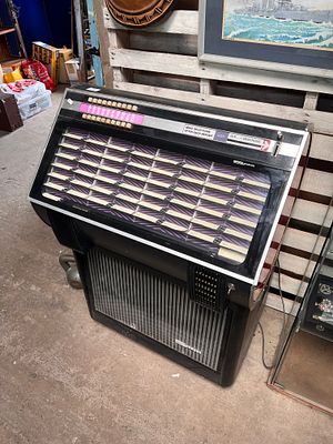A mid-century Seeburg Jukebox record player, not working.