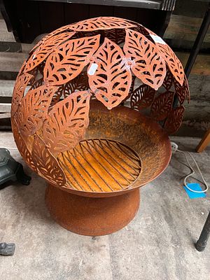 A modern leaf design fire pit. 65cm tall.