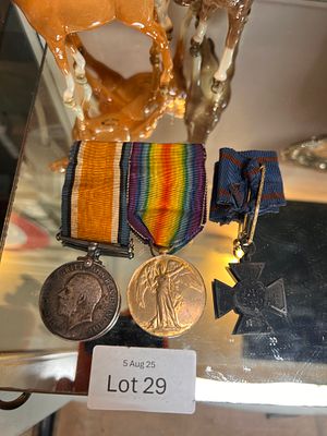 A pair of WW1 medals and similar medal.