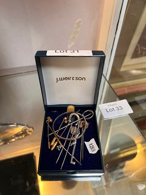 A selection tie pins, horse shoe design, a HM silver baby bangle, etc.