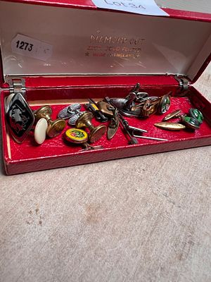 A selection of vintage cufflinks, including Shamrock pair and tie pin.