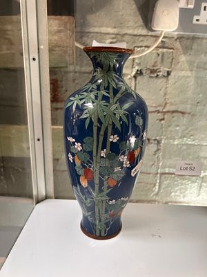 A Japanese cloisonne vase decorated with bamboo and lotus. 25cm tall. No damage.