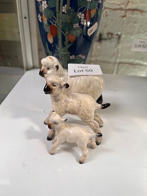 A set of three Beswick sheep, all good condition.