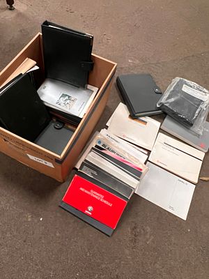 A selection of car manuals including Vauxhall, BMW, Land Rover, Alfa Romeo etc