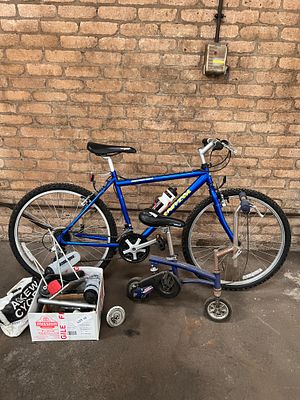 A mountain bike, skate or monkey bike and accessories.